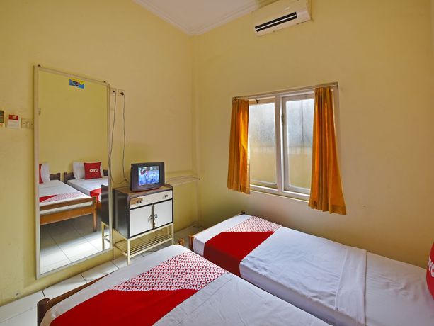 Imagen de la habitación del Hotel OYO 3722 Mutiara. Foto 16