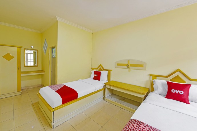 Imagen de la habitación del Hotel OYO 3722 Mutiara. Foto 17