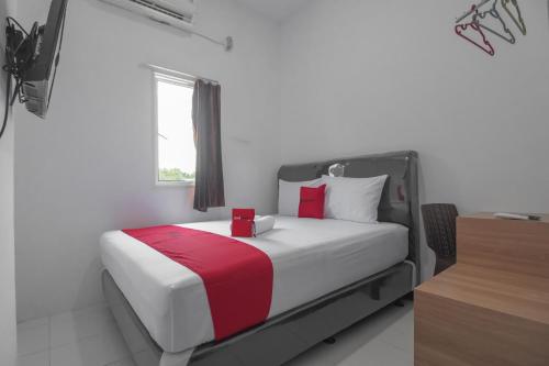 Imagen de la habitación del Hotel OYO 3729 Cattail Guest House. Foto 6