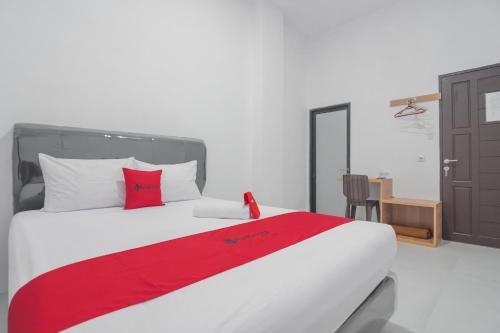 Imagen de la habitación del Hotel OYO 3729 Cattail Guest House. Foto 7