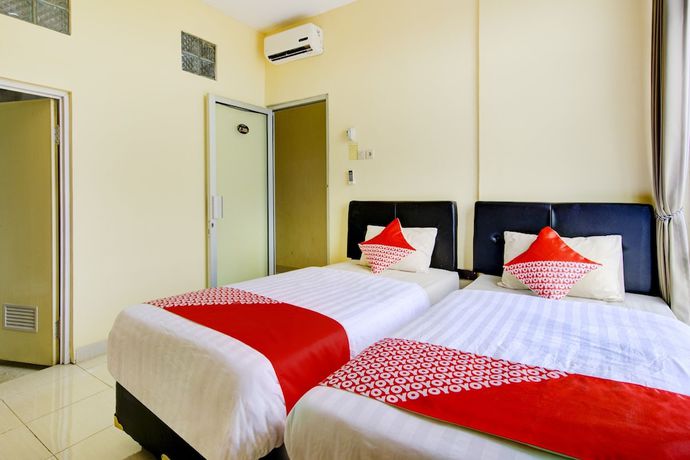 Imagen de la habitación del Hotel OYO 3746 Double Tree Guesthouse. Foto 10