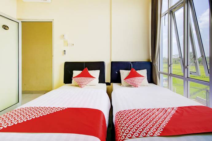 Imagen de la habitación del Hotel OYO 3746 Double Tree Guesthouse. Foto 11