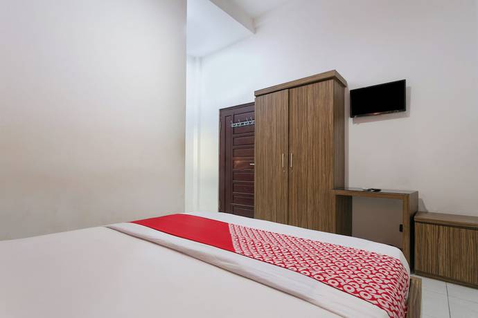 Imagen de la habitación del Hotel OYO 3762 Wisma Focus. Foto 7