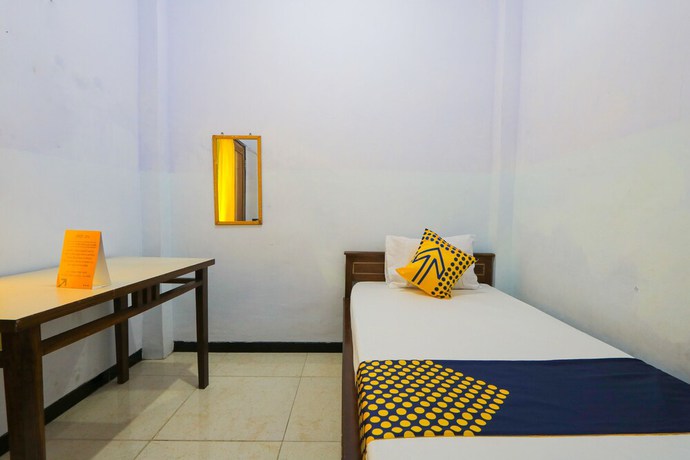 Imagen de la habitación del Hotel OYO 3826 Columbus Residence K11. Foto 14