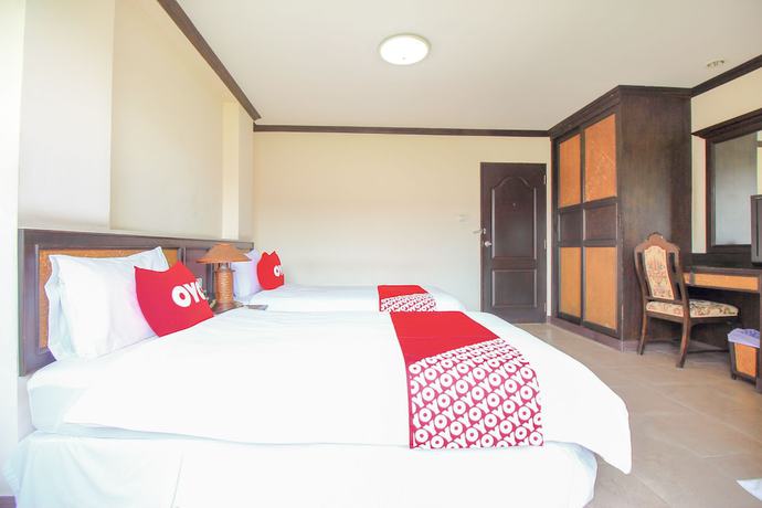 Imagen de la habitación del Hotel OYO 383 White Inn. Foto 2