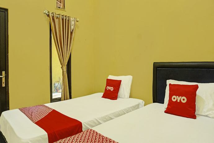 Imagen de la habitación del Hotel OYO 3857 Sweet Candy 1 Syariah. Foto 5