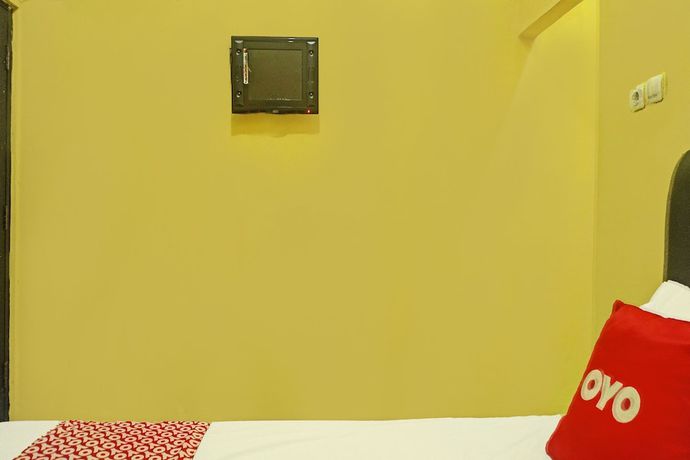 Imagen de la habitación del Hotel OYO 3857 Sweet Candy 1 Syariah. Foto 11