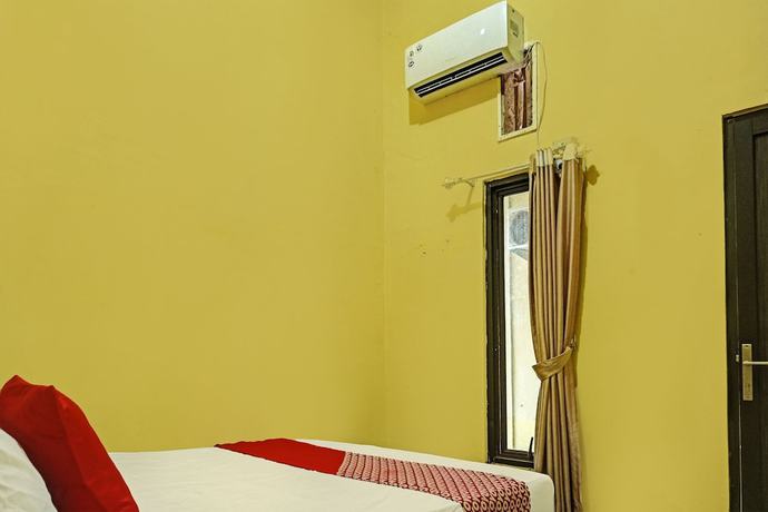 Imagen de la habitación del Hotel OYO 3857 Sweet Candy 1 Syariah. Foto 12