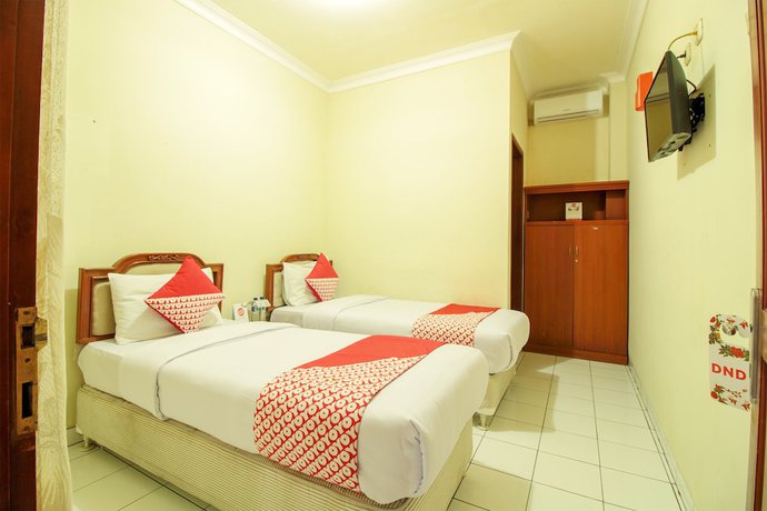 Imagen de la habitación del Hotel OYO 387 Alfa Guest House. Foto 17