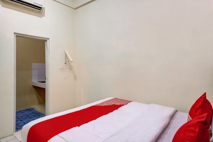 Imagen de la habitación del Hotel OYO 3878 Graha Hsc Syariah. Foto 4
