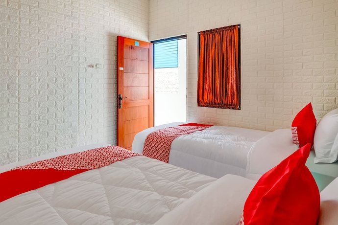 Imagen de la habitación del Hotel OYO 3878 Graha Hsc Syariah. Foto 5