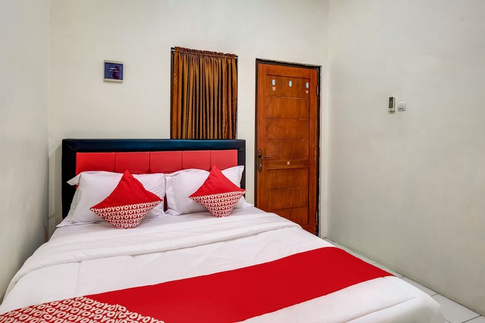 Imagen de la habitación del Hotel OYO 3878 Graha Hsc Syariah. Foto 7