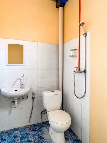 Imagen de la habitación del Hotel OYO 3878 Graha Hsc Syariah. Foto 14