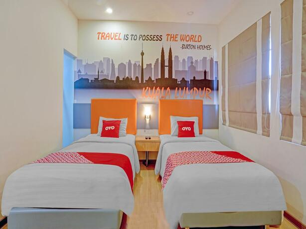 Imagen general del Hotel OYO 3905 Graha 100 Guest House Syariah. Foto 4