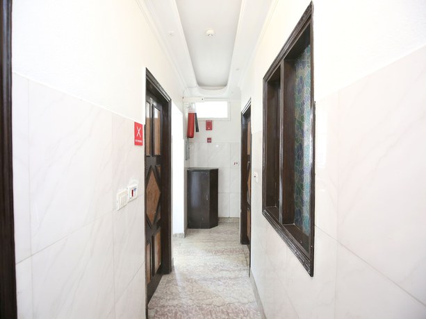 Imagen de los interiores del Hotel OYO 3933 City Heart 18. Foto 17