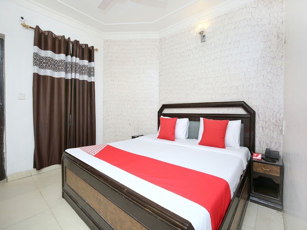 Imagen de la habitación del Hotel OYO 3933 City Heart 18. Foto 12