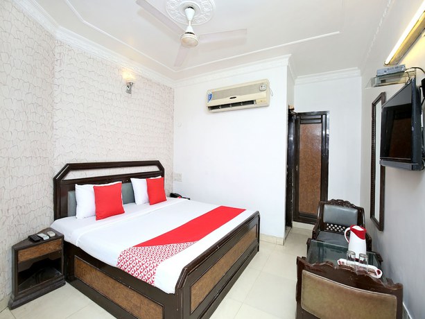 Imagen de la habitación del Hotel OYO 3933 City Heart 18. Foto 15