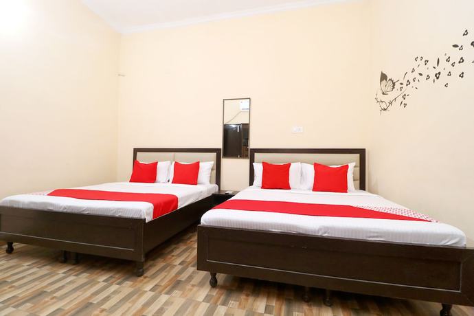 Imagen de la habitación del Hotel OYO 39626 Rj Royal Guest House. Foto 7