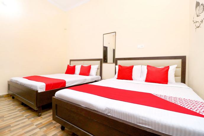 Imagen de la habitación del Hotel OYO 39626 Rj Royal Guest House. Foto 12