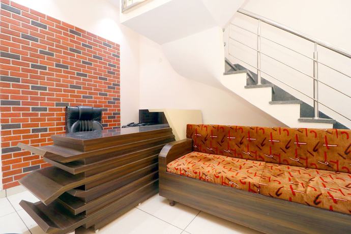 Imagen de los interiores del Hotel OYO 39759 Kesari Root. Foto 18