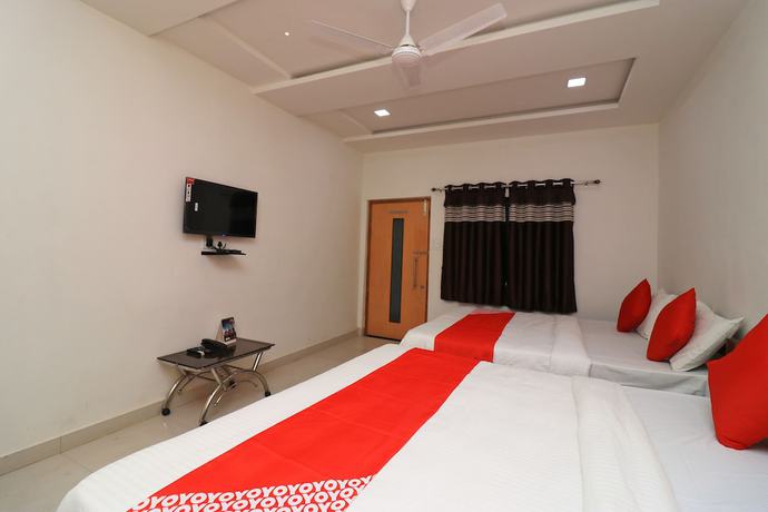 Imagen de la habitación del Hotel OYO 39764 Mahendra Greens. Foto 11