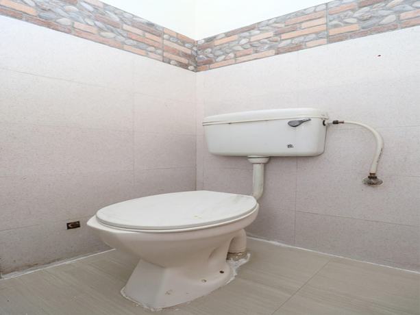 Imagen de la habitación del Hotel OYO 39812 Welcome Lounge. Foto 6