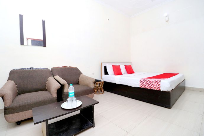 Imagen de la habitación del Hotel OYO 39812 Welcome Lounge. Foto 10