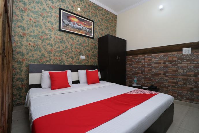 Imagen de la habitación del Hotel OYO 39812 Welcome Lounge. Foto 13