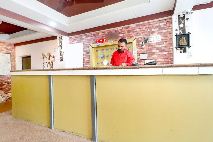 Imagen de los interiores del Hotel OYO 39812 Welcome Lounge. Foto 16