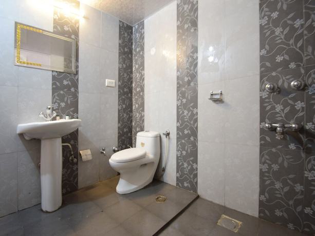Imagen de la habitación del Hotel OYO 40460 Paradise Studio. Foto 3
