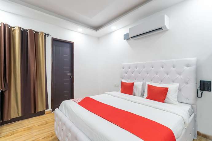 Imagen de la habitación del Hotel OYO 40460 Paradise Studio. Foto 12