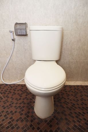 Imagen de la habitación del Hotel OYO 405 Wisma Yosoputro. Foto 2