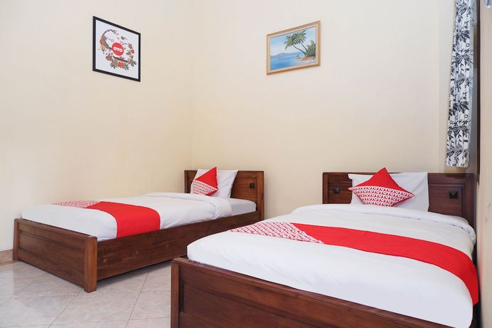 Imagen de la habitación del Hotel OYO 405 Wisma Yosoputro. Foto 3