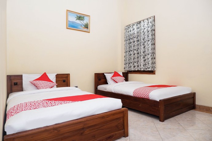 Imagen de la habitación del Hotel OYO 405 Wisma Yosoputro. Foto 4