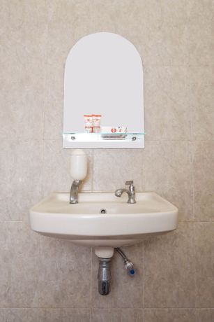 Imagen de la habitación del Hotel OYO 405 Wisma Yosoputro. Foto 7