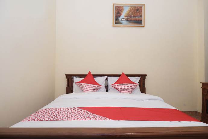 Imagen de la habitación del Hotel OYO 405 Wisma Yosoputro. Foto 8