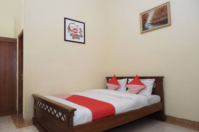 Imagen de la habitación del Hotel OYO 405 Wisma Yosoputro. Foto 9