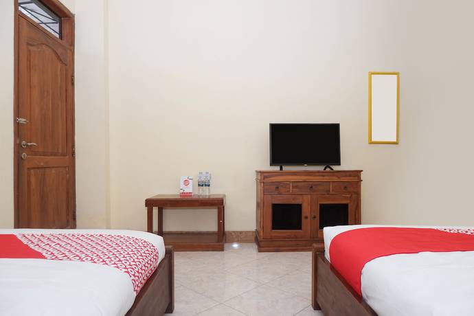 Imagen de la habitación del Hotel OYO 405 Wisma Yosoputro. Foto 10