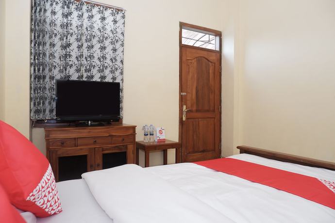 Imagen de la habitación del Hotel OYO 405 Wisma Yosoputro. Foto 11