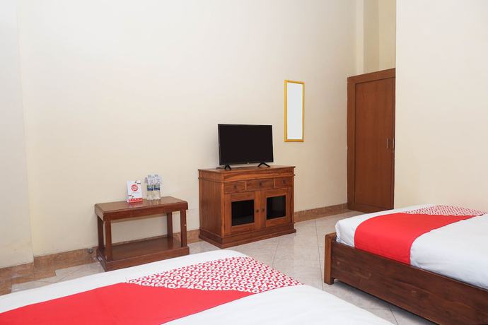 Imagen de la habitación del Hotel OYO 405 Wisma Yosoputro. Foto 12