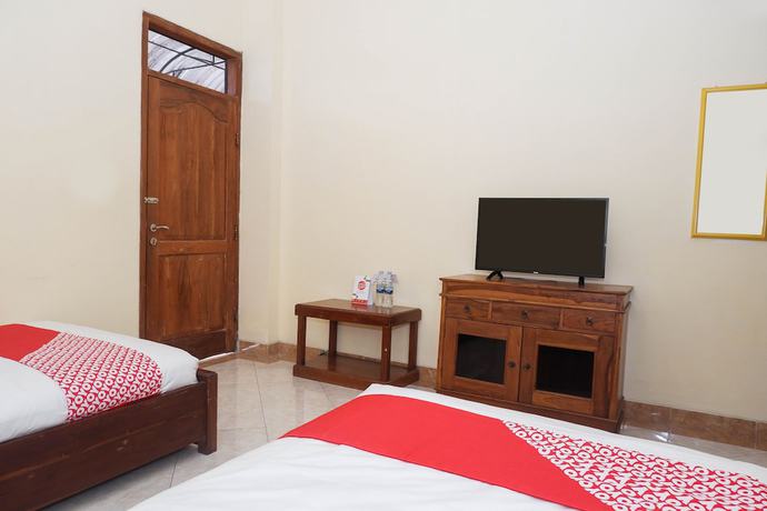 Imagen de la habitación del Hotel OYO 405 Wisma Yosoputro. Foto 13