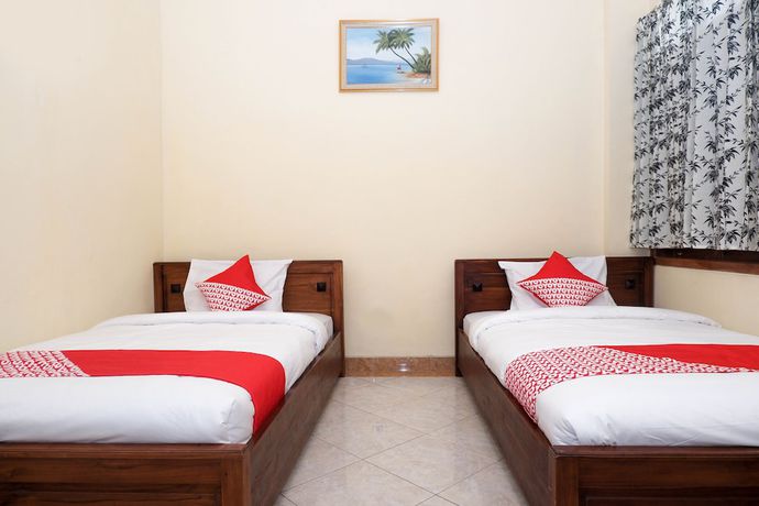 Imagen de la habitación del Hotel OYO 405 Wisma Yosoputro. Foto 14