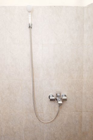 Imagen de la habitación del Hotel OYO 405 Wisma Yosoputro. Foto 15