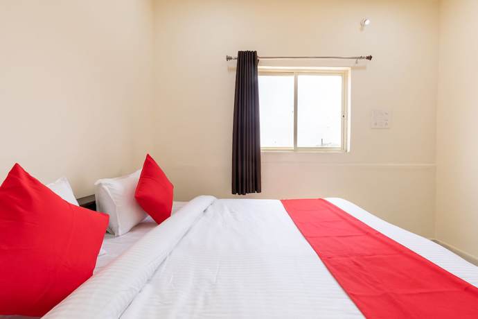 Imagen de la habitación del Hotel OYO 40682 Lake City Pride. Foto 11