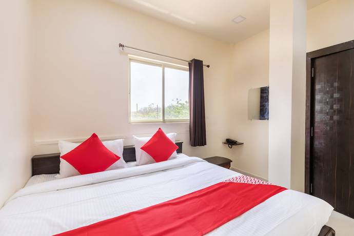 Imagen de la habitación del Hotel OYO 40682 Lake City Pride. Foto 13