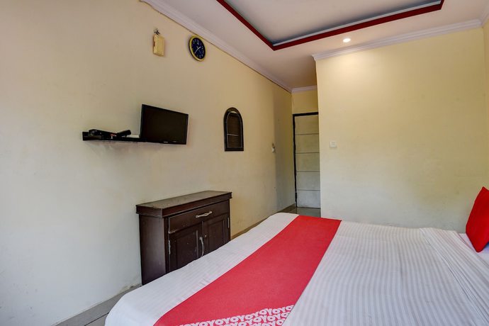 Imagen de la habitación del Hotel OYO 4073 Esskay. Foto 5
