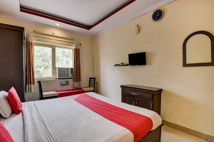 Imagen de la habitación del Hotel OYO 4073 Esskay. Foto 8