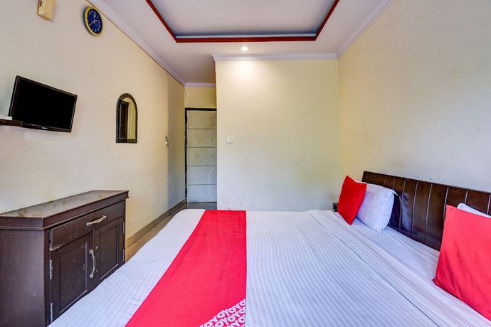 Imagen de la habitación del Hotel OYO 4073 Esskay. Foto 11