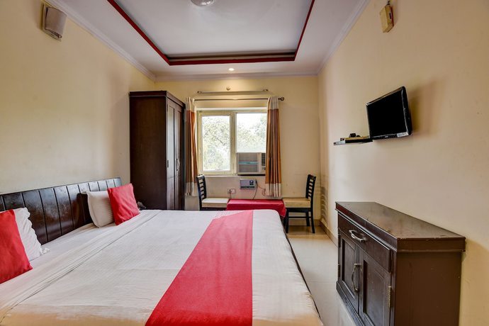 Imagen de la habitación del Hotel OYO 4073 Esskay. Foto 13