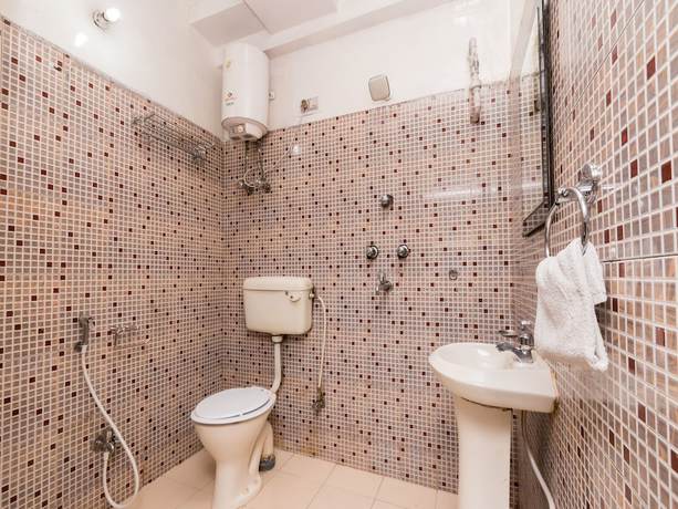 Imagen de la habitación del Hotel OYO 4144 The Banquet. Foto 6